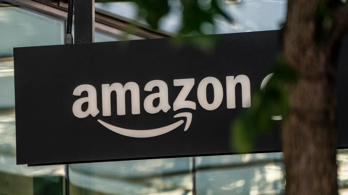 A sign is seen outside of an Amazon Go store at the Amazon.com Inc. headquarters on May 20, 2021 in Seattle, Washington.