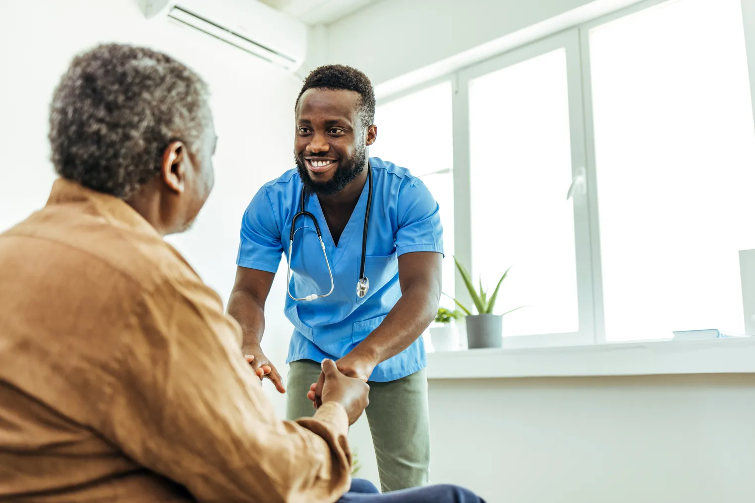 Nurse sees elder patient in nursing home