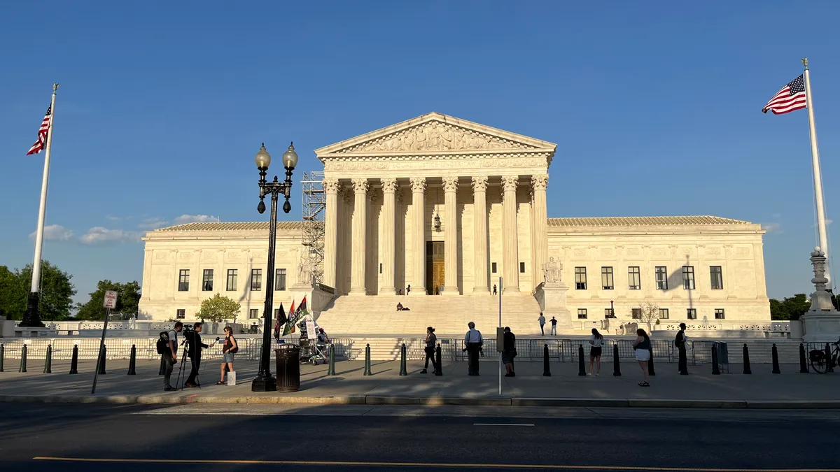 People gather outside the U.S. Supreme Court in Washington, D.C. on Friday, April 21.